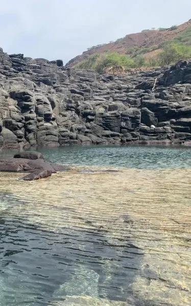 Natural pool among volcanic rocks
